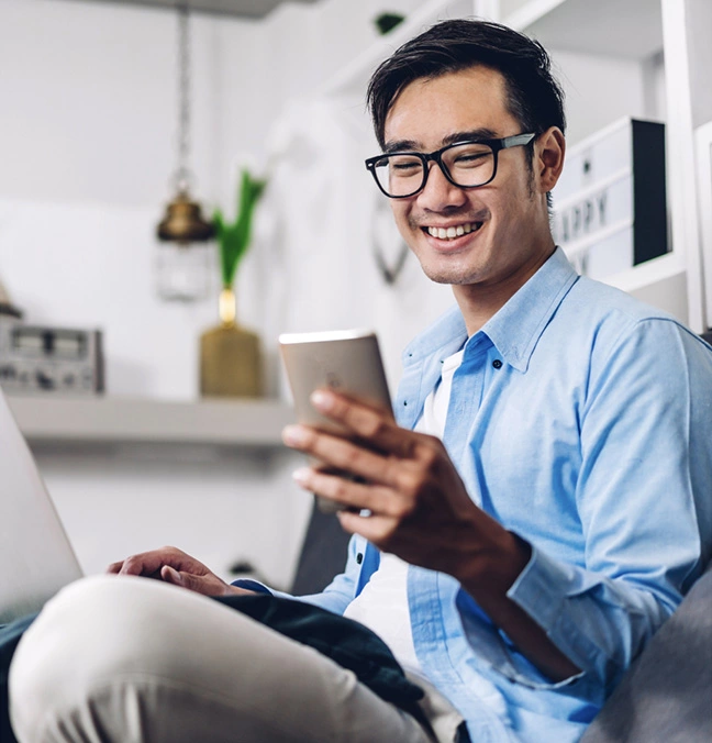 Tech savvy man using the Habitap ONE app at home